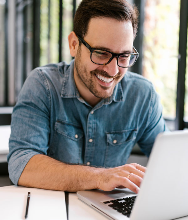 happy man on computer